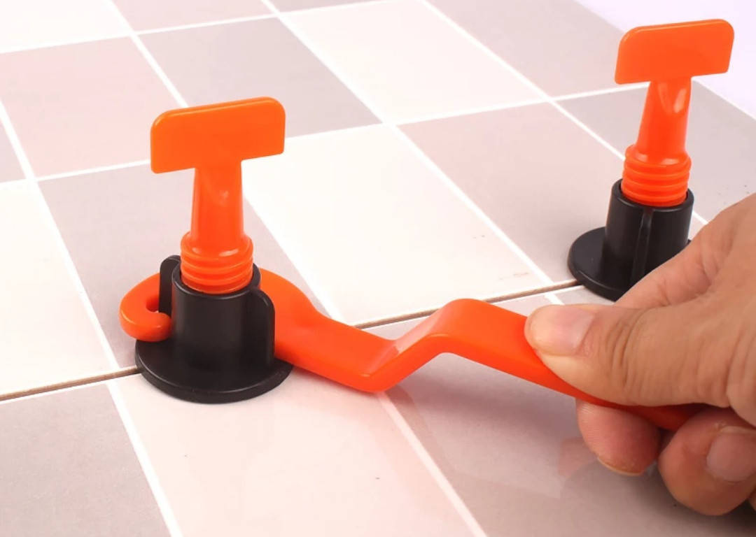 

Багаторазова система вирівнювання плитки СВП 50 шт / уп. + ключ Premium