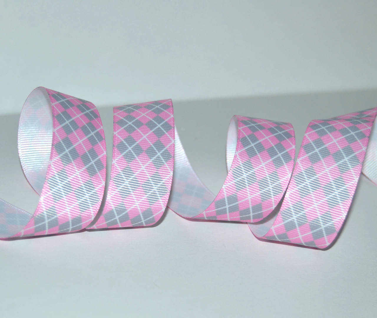 

Стрічка репсова 2,5см, клітинка, колір- сіро-рожевий