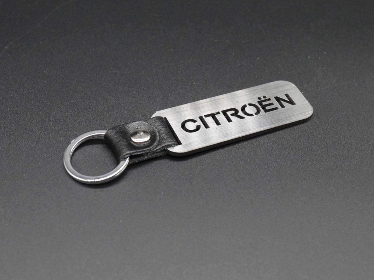 

Брелок металлический. CITROEN. 10х2,5см, Коричневый