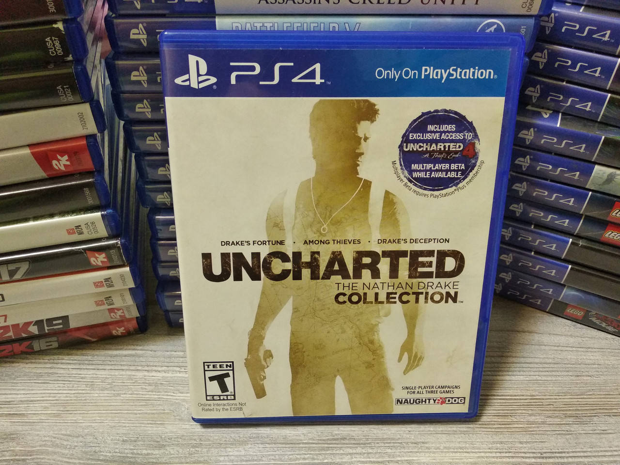 

Диск с игрой Uncharted The Nathan Drake Collection на PS4/PS5