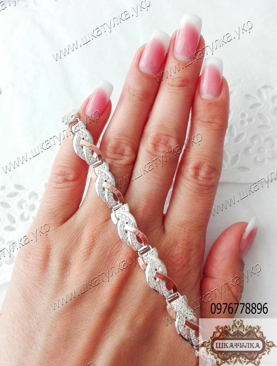 

Серебряный браслет с золотом и цирконом