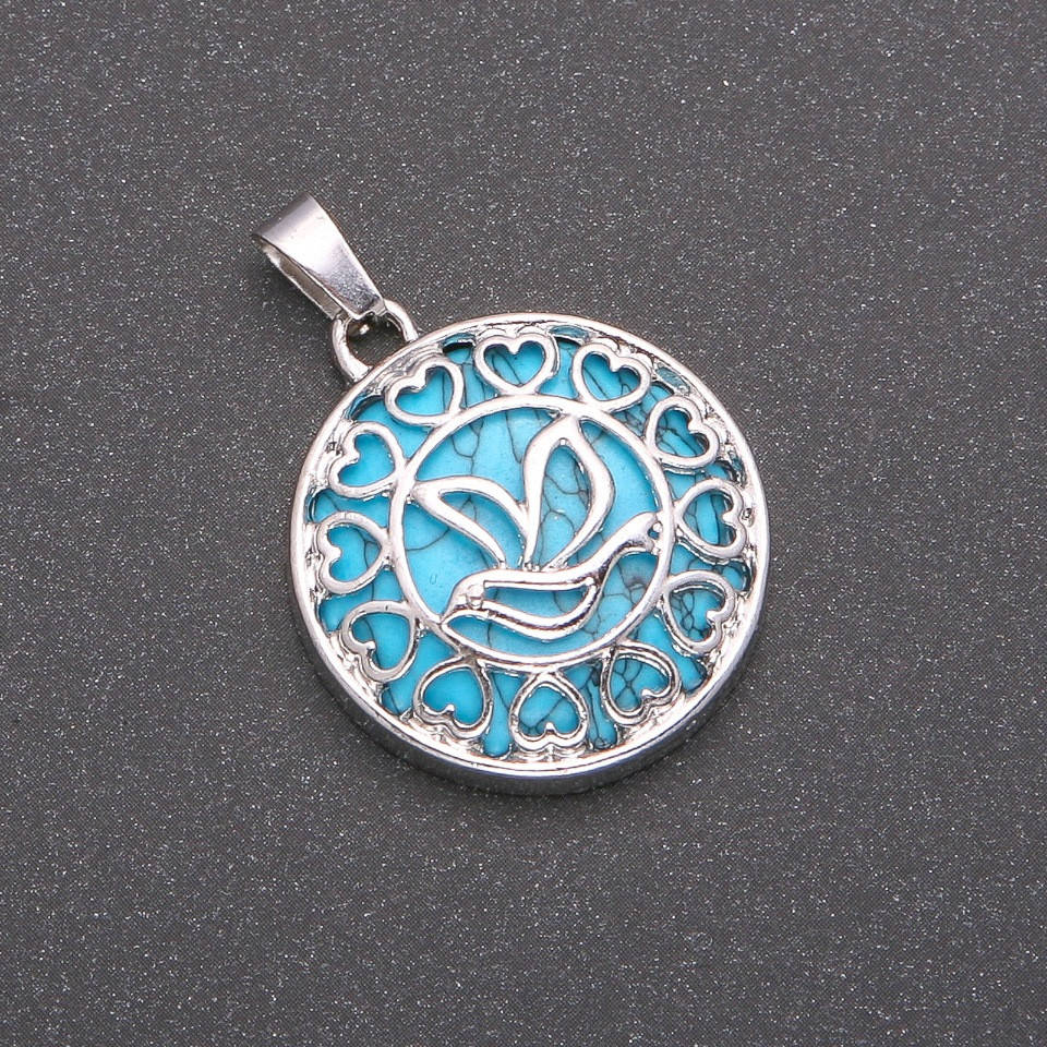 

Кулон из натурального камня Голубая Бирюза в оправе, диаметр 27мм