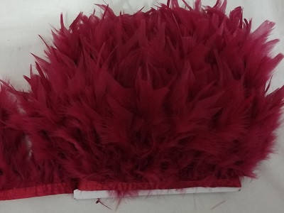 

Перьевая тесьма из перьев индюка. Цвет Бургунди. Перо 12-17см. Цена за 0,5м.