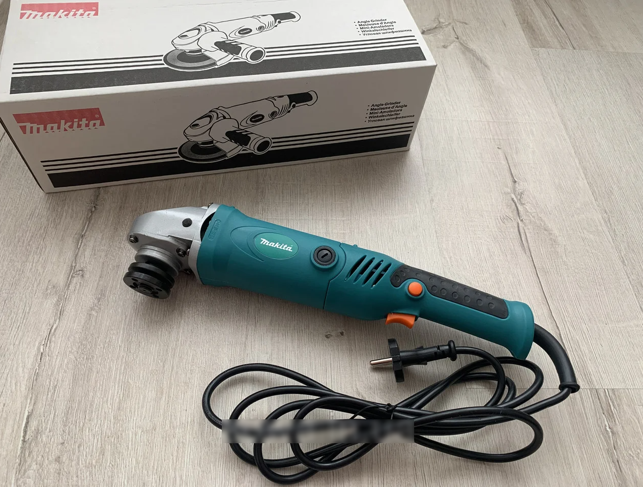 

Болгарка Makita GA5021 (1050Вт / 125мм)