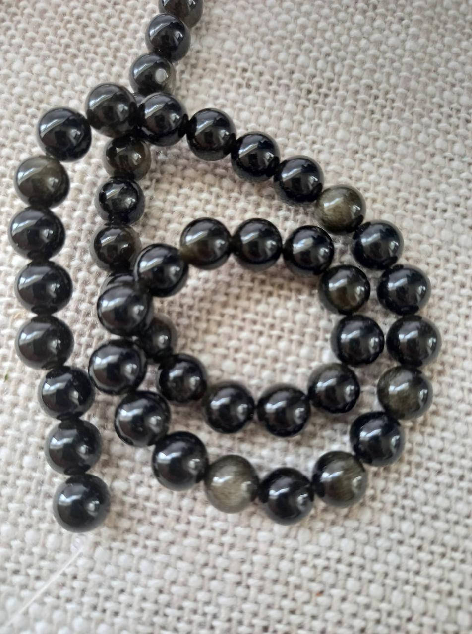 

Обсидиан золотой, 8 мм, нить