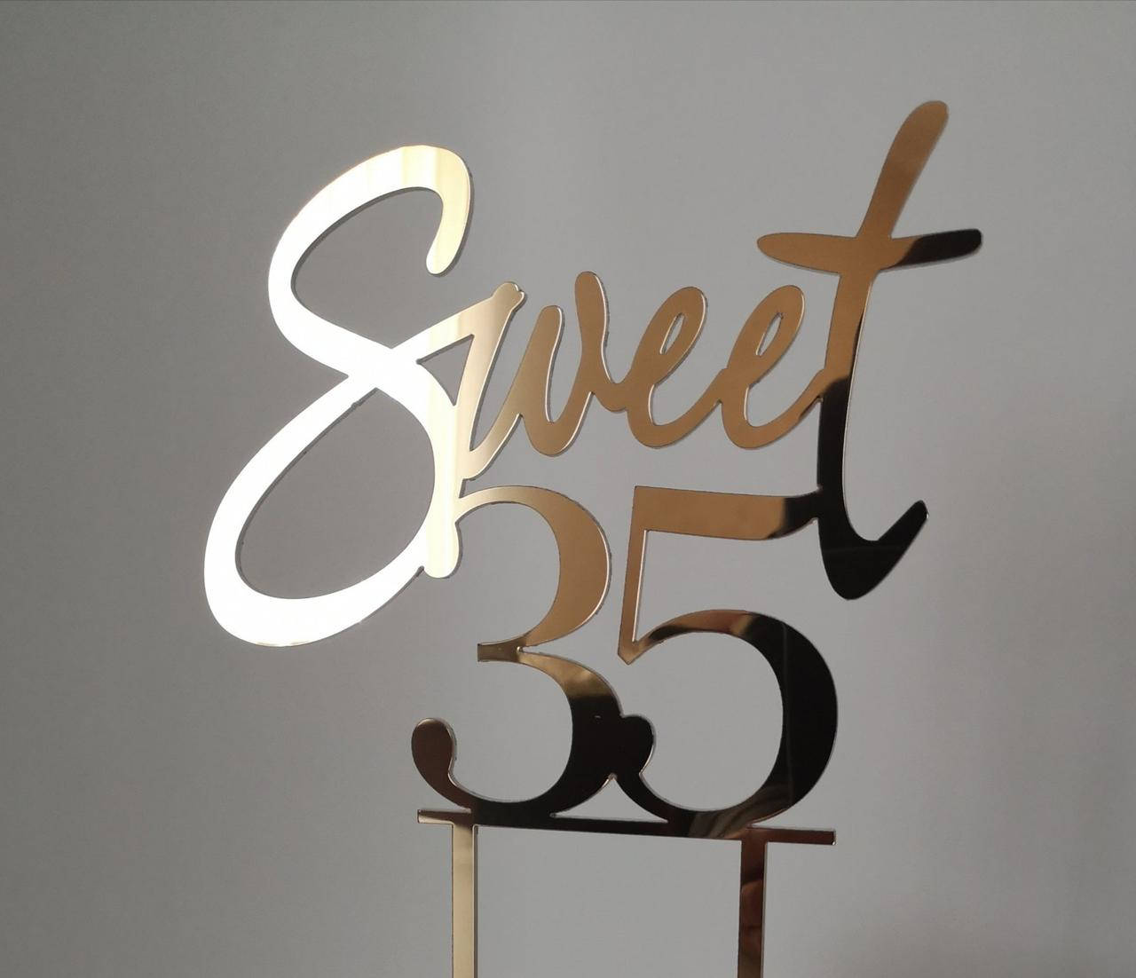 

Топпер в торт зеркальный пластик золотой Sweet 35