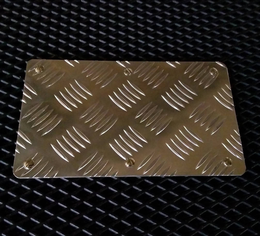 

Алюминиевый подпятник на водительский автоковрик