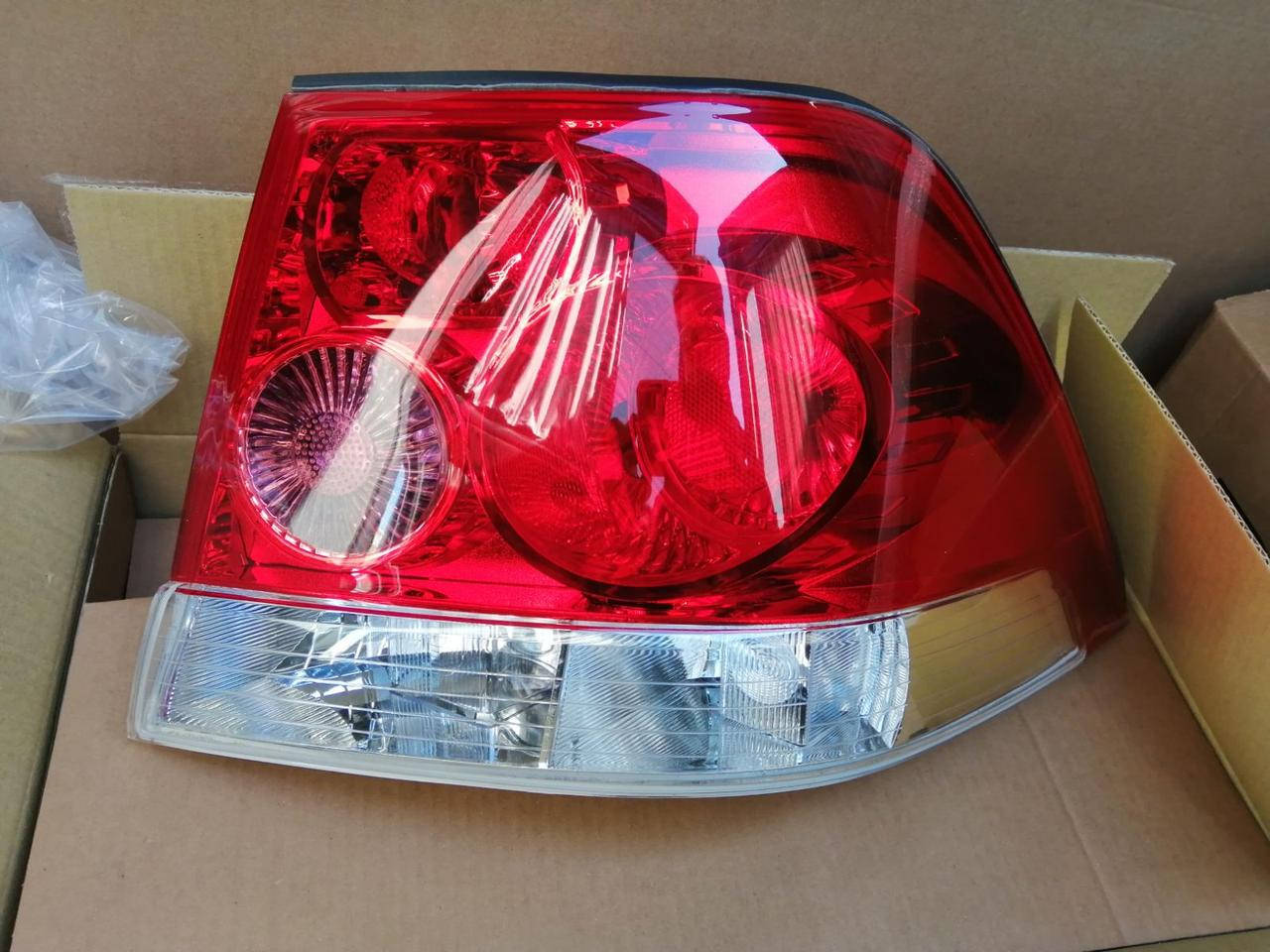 

Фонарь правый Opel Astra H 2003-2014 седан (1222780)