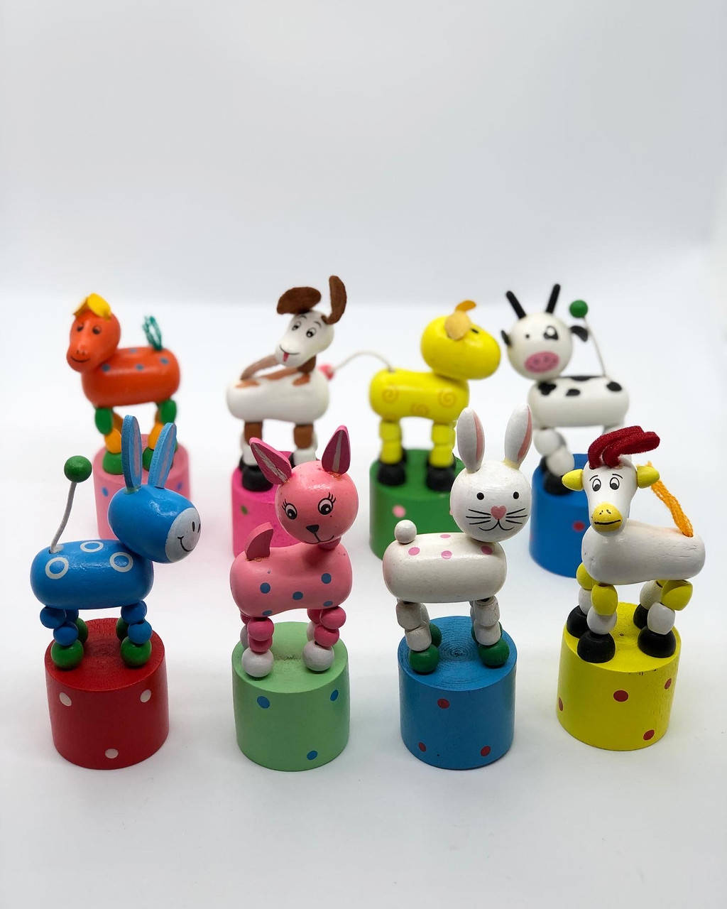 

Деревянная игрушка Звери падающие 12шт.