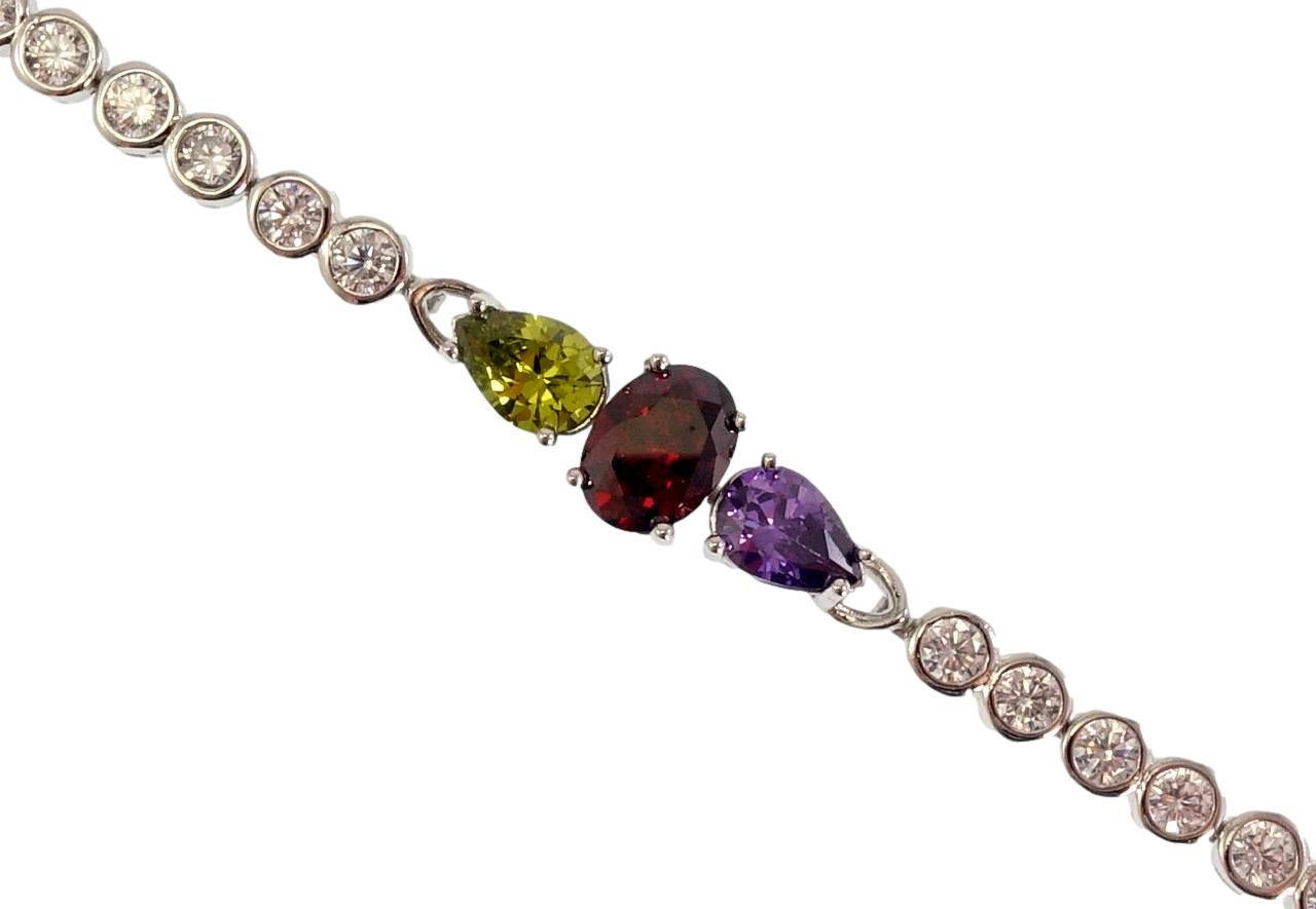 

Браслет Xuping Родий "Дорожка кристаллов с вставкой из цветных фианитов" длина с доп. замком 17,18.5см х 4-7мм