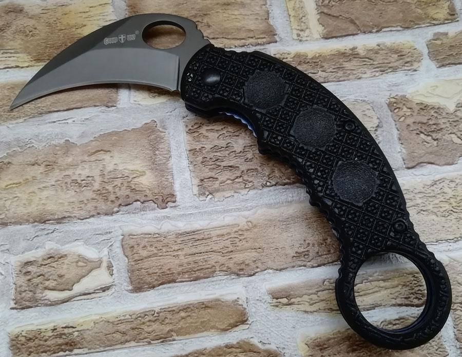 

Нож складной керамбит (коготь) из игры CS:GO в стильном дизайне, Черный