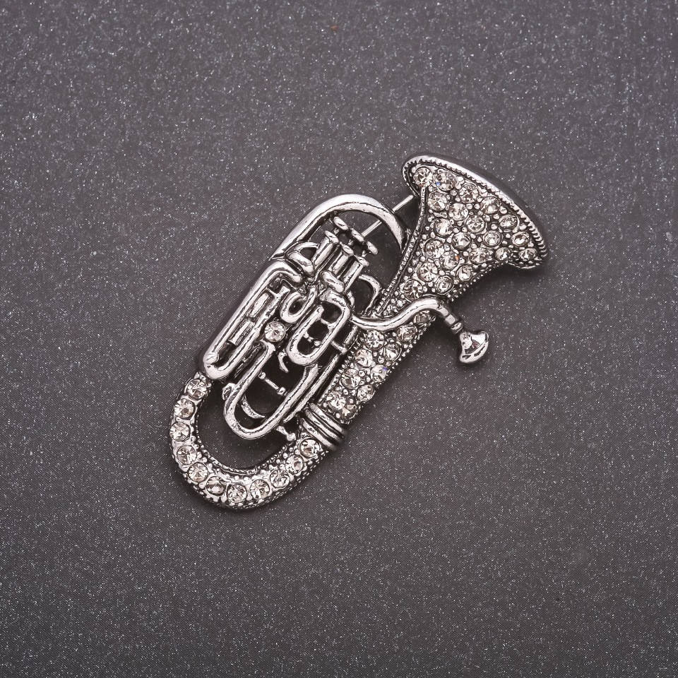 

Брошь Труба в стразах серый металл 47х25мм