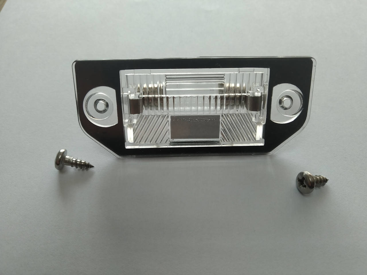 

Подсветка номера Passat B5 1997-2000р. 3B0943021 (AIC 53469)