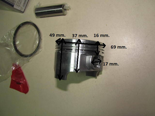 

Поршень с кольцами на мотоцикл 250 кубов 69 мм.