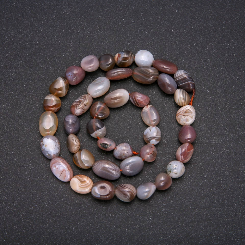 

Бусины из натурального камня Агат галтовка d-8х10(+-)мм L-38см