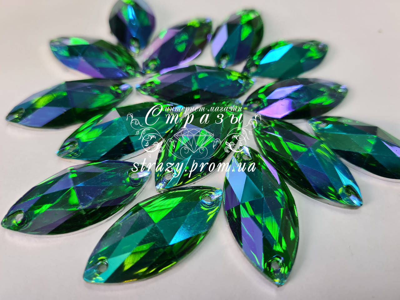 

Стразы пришивные Маркиз 15х32мм. Акрил Emerald AB