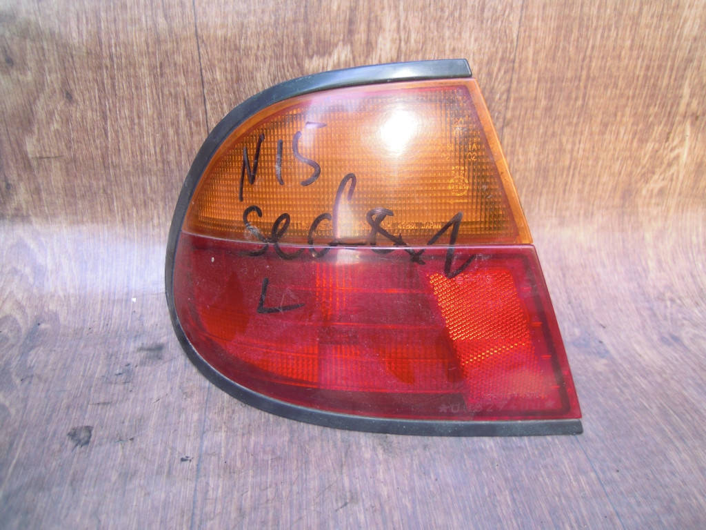 

Фонарь стоп задний левый Nissan Almera N15 1995-2000г.в. Седан