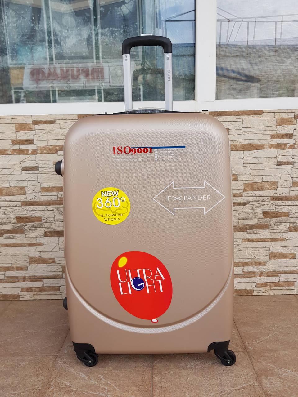 

Чемодан  на 4-х колесах GRAVITT 1625 (ГРАВИТ, Золотистый