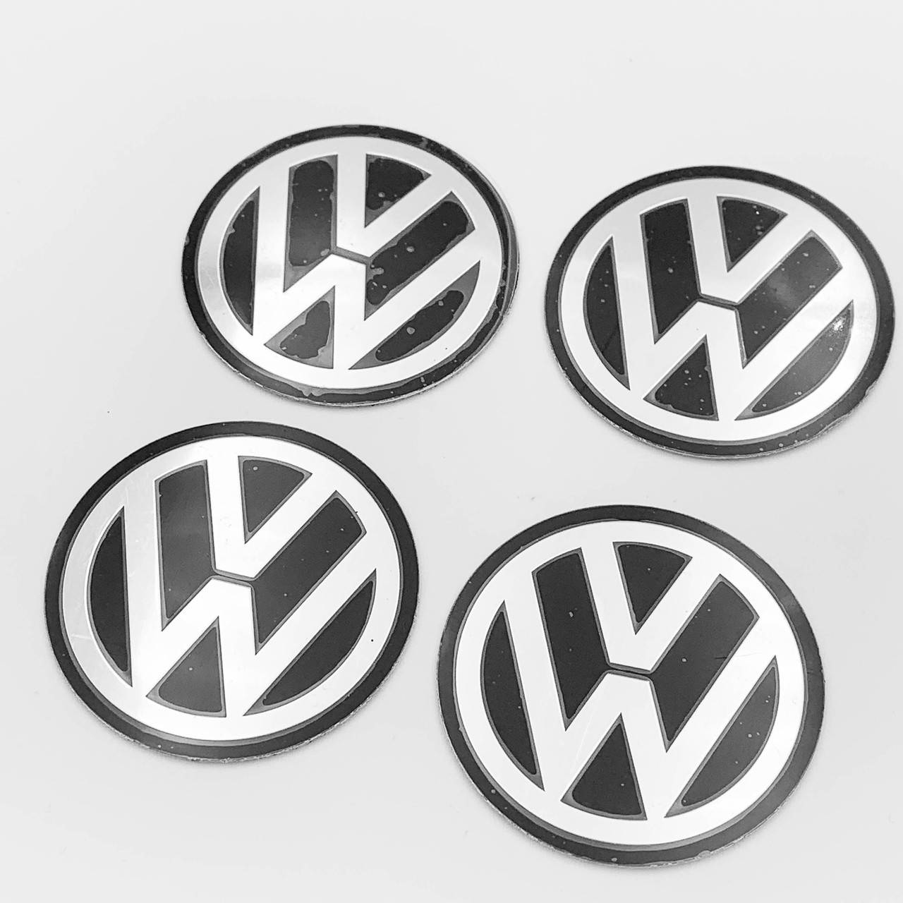 

Наклейки на колпачки заглушки в диски VW Volkswagen (Фольсфаген) 56 мм Черные 4 шт, Черный