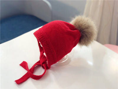 

Детская теплая шапка на завязочках