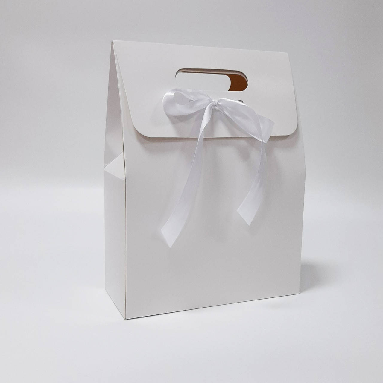 

Пакет подарочный белый 220х100х300 мм.