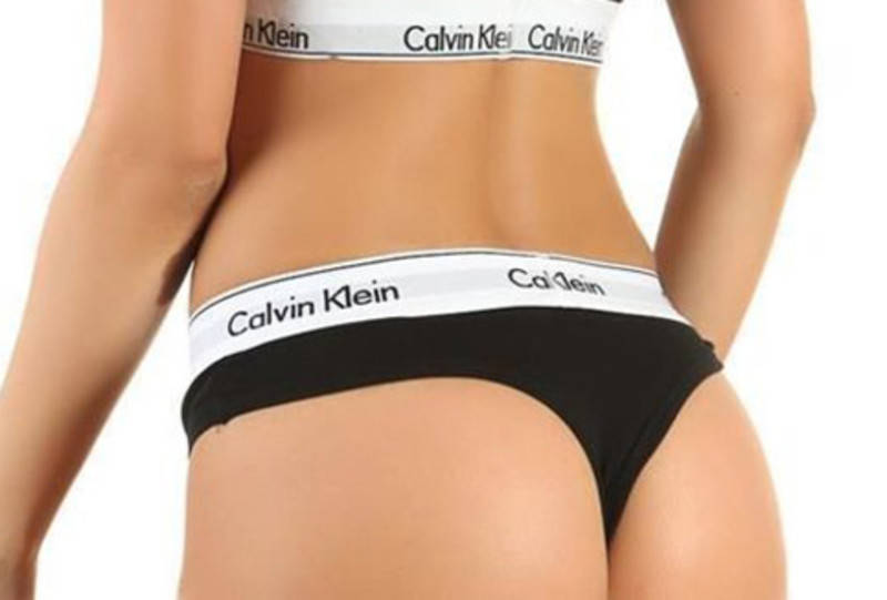 

Стринги женские Calvin Klein черные с белой резинкой, Черный