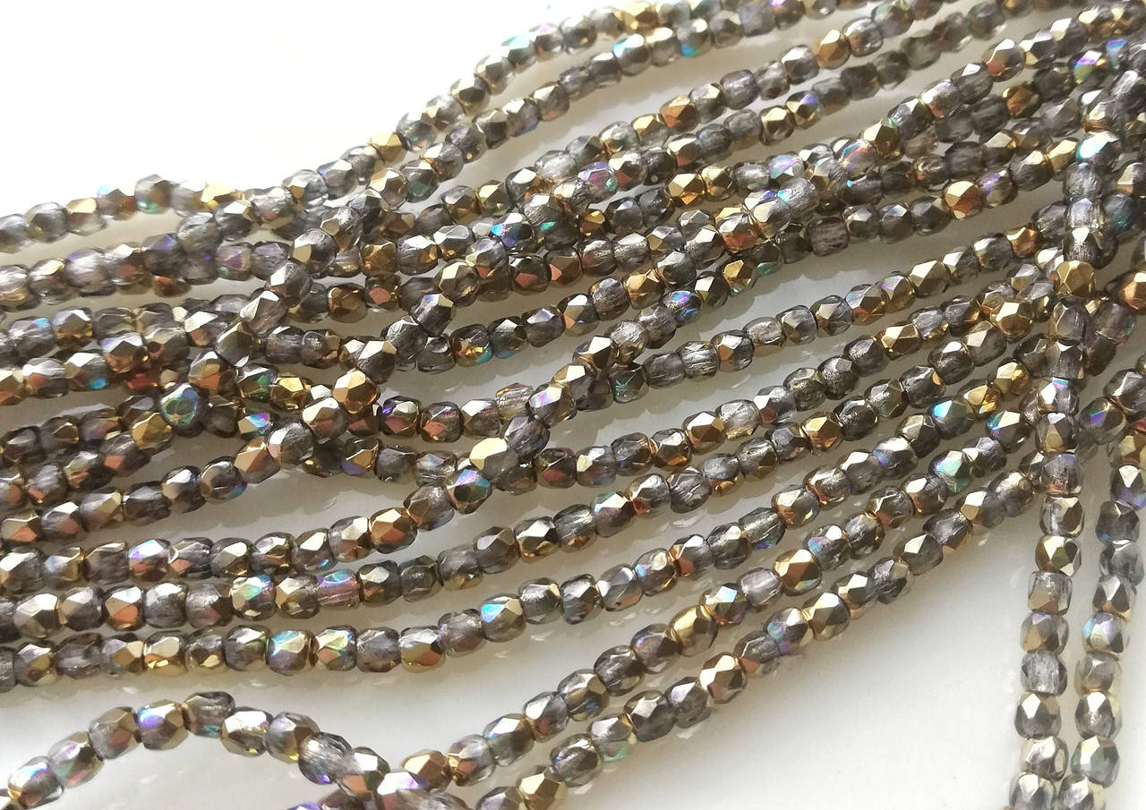 

Fire polished 2 mm Olivine Golden Rainbow