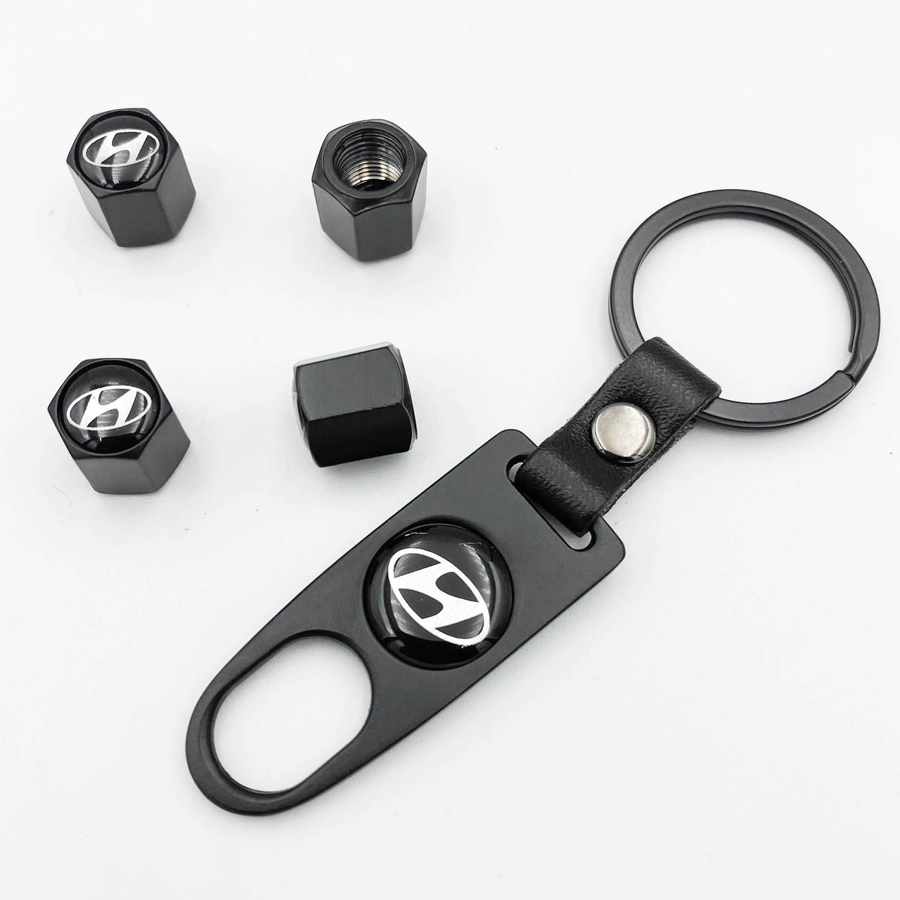 

Защитные колпачки на ниппеля HYUNDAI (Хундай) c брелком Черные Антивандальные