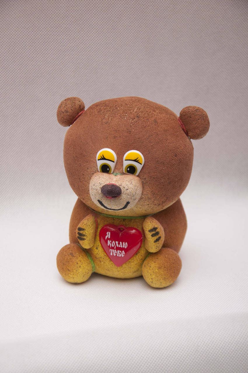 

Декоративный газон "Медведь с сердечком сувенир"