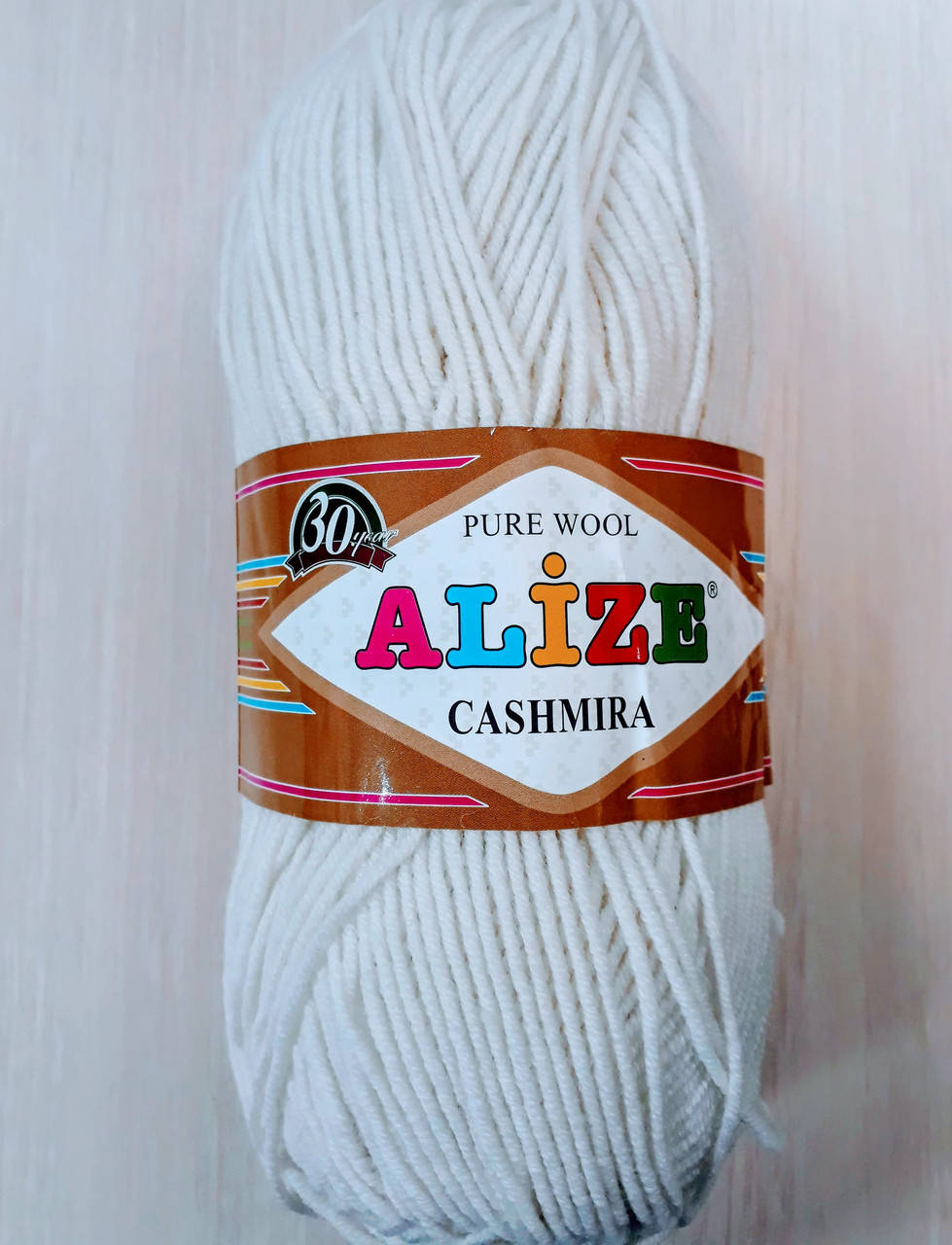 

Пряжа Cashmira Alize. 100% шерсть .100г - 300м белый 55