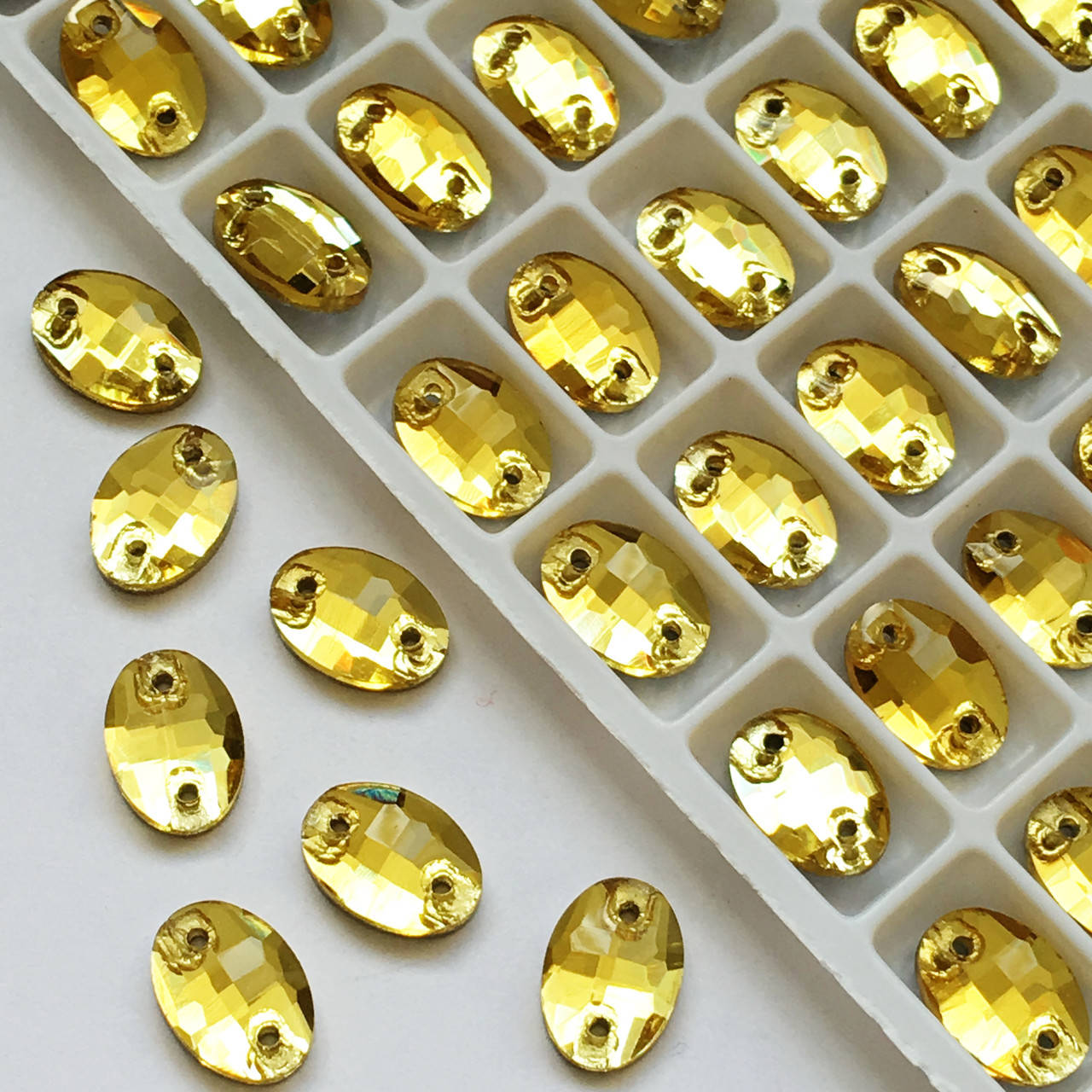 

Пришивные овалы Topaz 7х10мм.Цена за 1шт