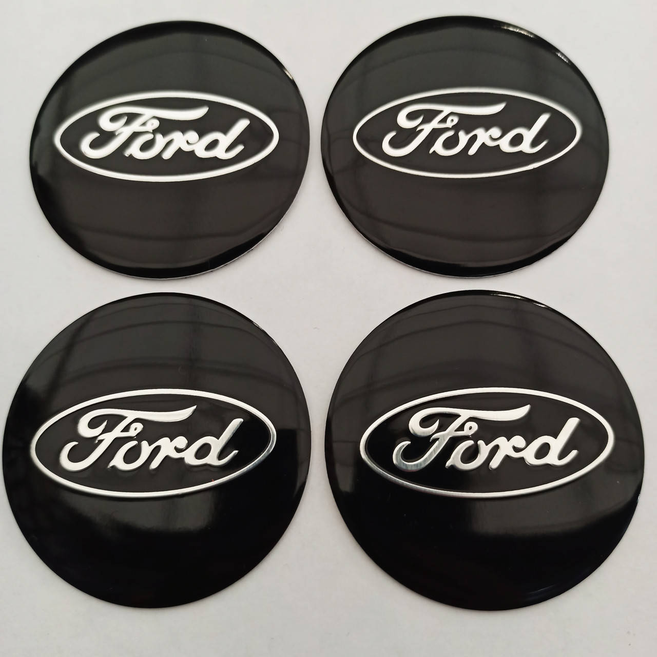 

Наклейка выпуклая на колпачок диска Ford черная 56 мм, Черный