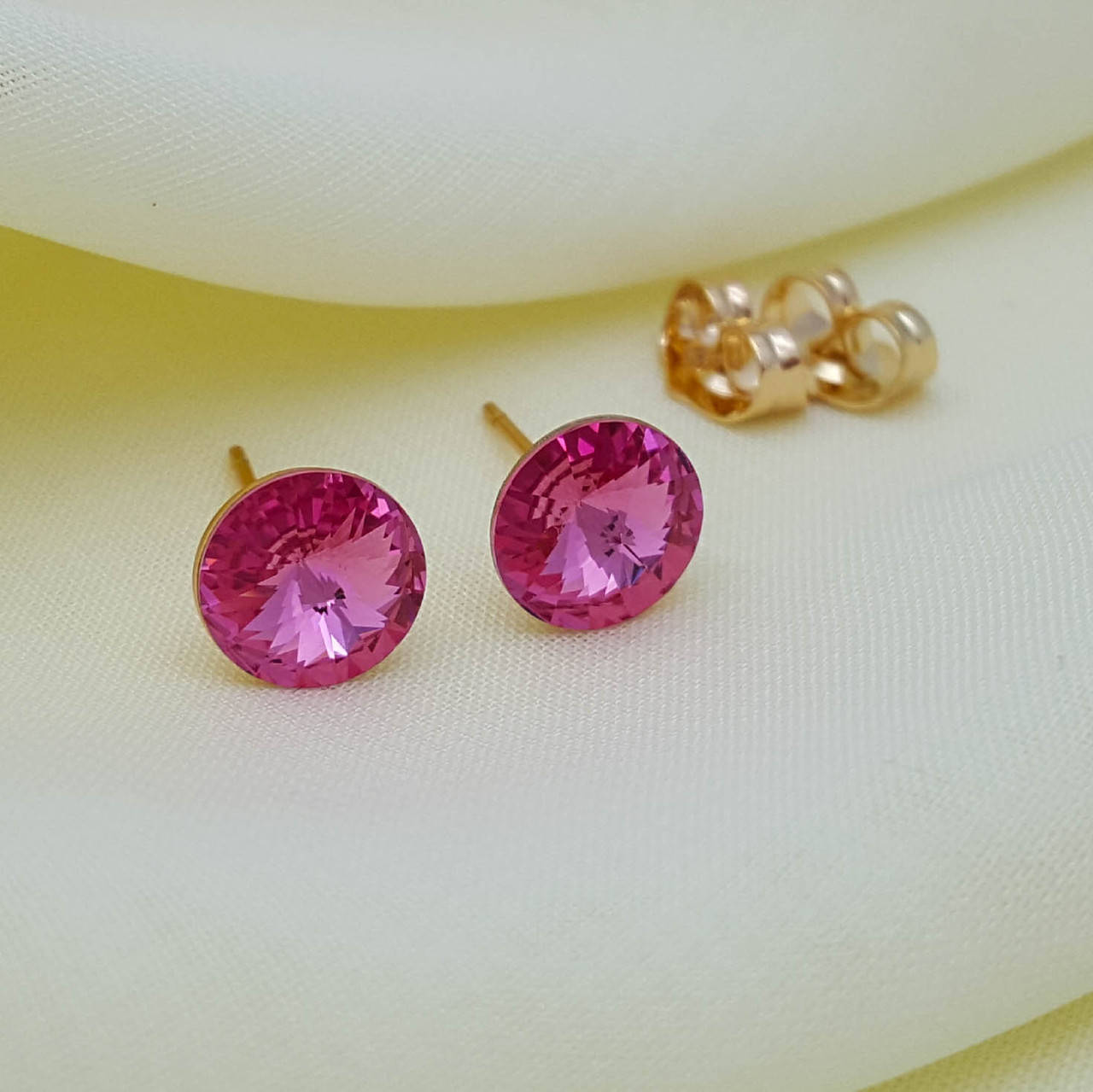 

Серьги гвоздики, розовые Swarovski, медзолото Xuping, 18К