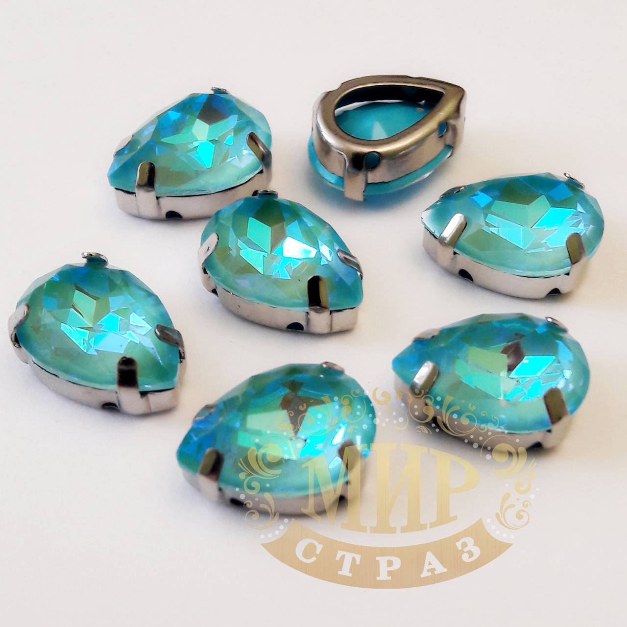 

Стразы в цапах Люкс, форма Капля, цвет Aqua DeLite, 10х14мм, 1шт, Белый