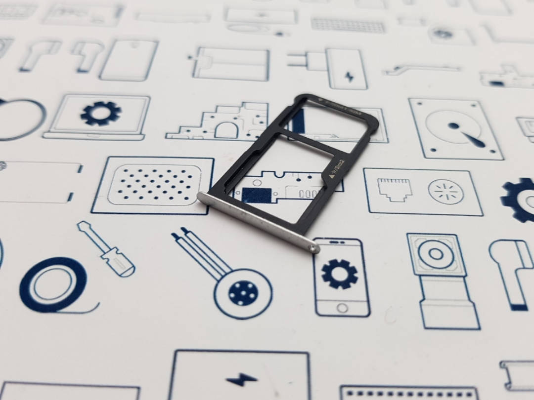 

Держатель сим карты Huawei P9 lite VNS-L21 серебро Сервисный оригинал с разборки