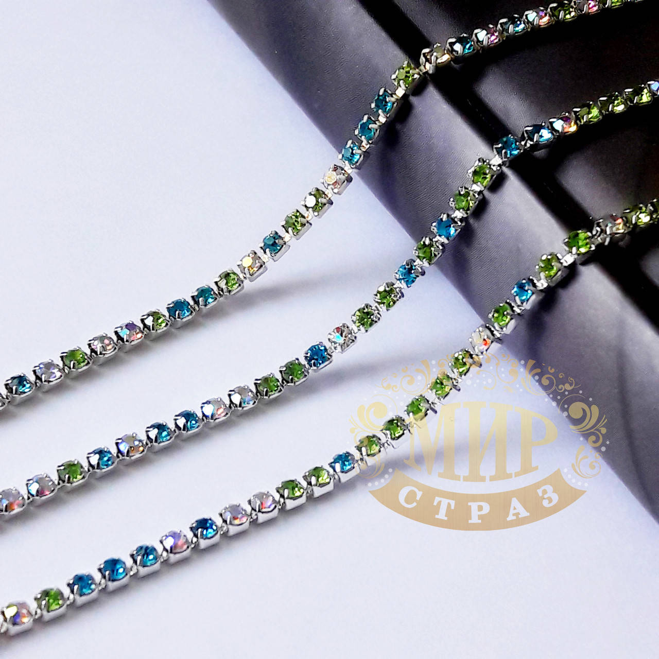 

Стразовая цепочка, цвет Multicolor (Aqua+Peridot+AB), ss10 (2,8mm), металл серебро, 1м