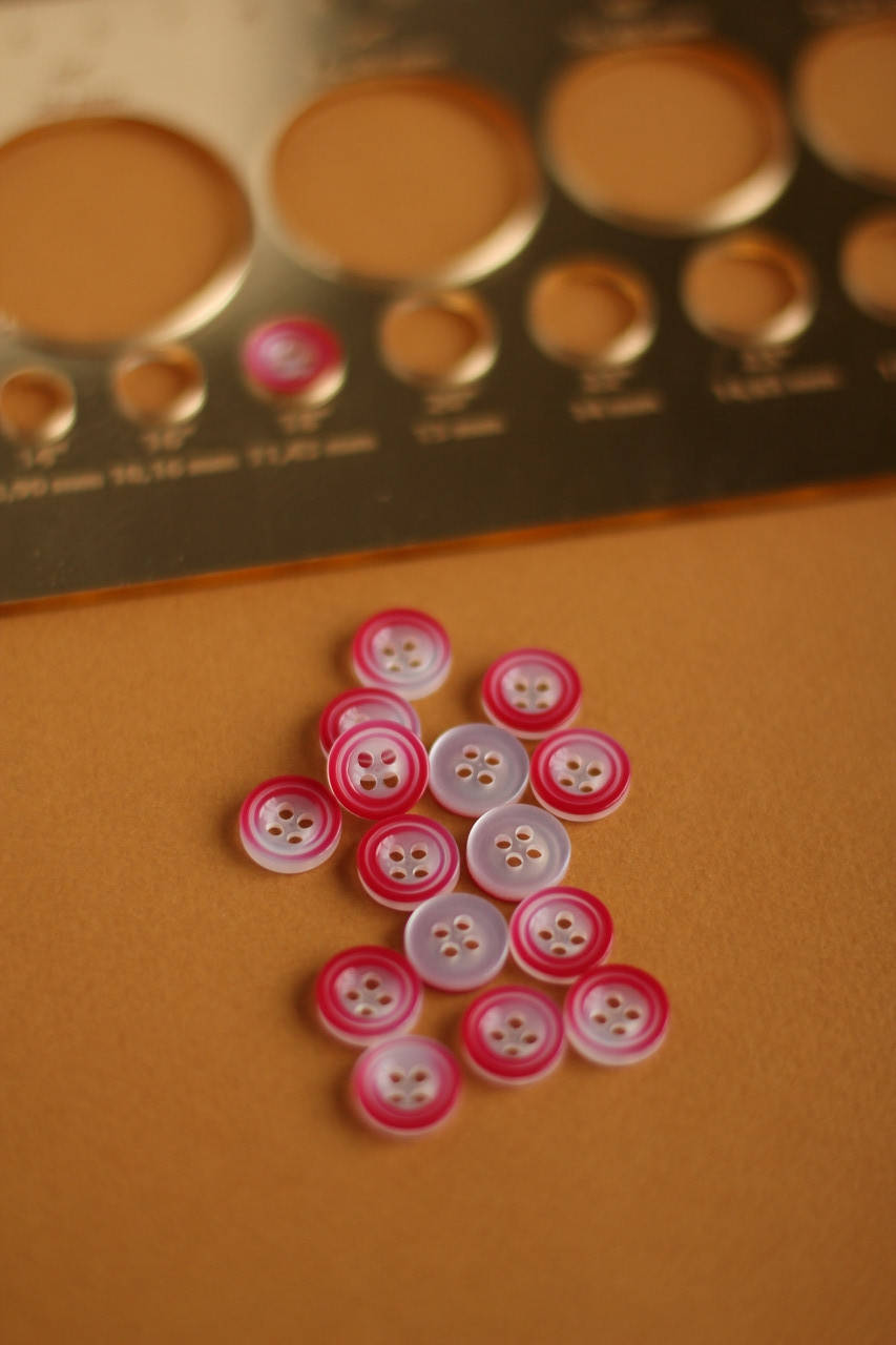 

Пуговицы полупрозрачные розовые 11.5мм