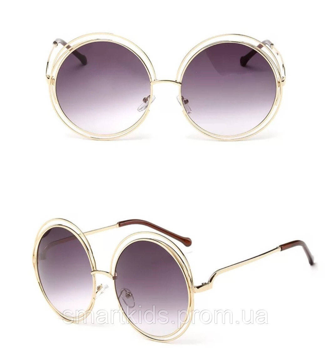 

Элегантные большие круглые очки с градиентными стеклами.