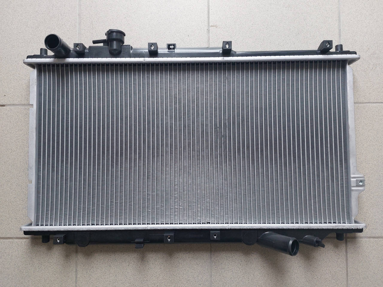 

Радиатор охлаждения Kia Sephia 1.5i,1.6i,1.8i 16v, 93-98