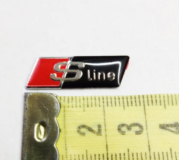 

Шильдик надпись Sline black на руль