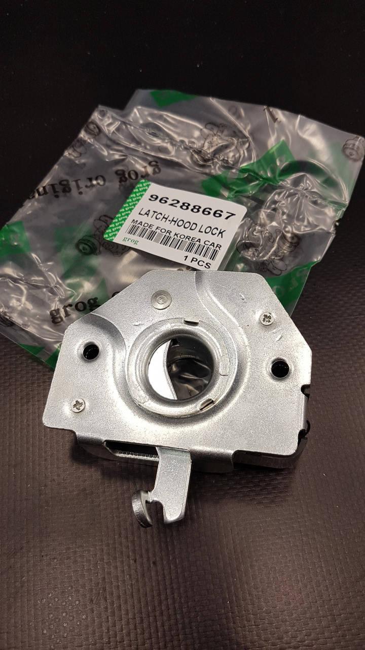 

Замок капота на панели Нексия grog Корея