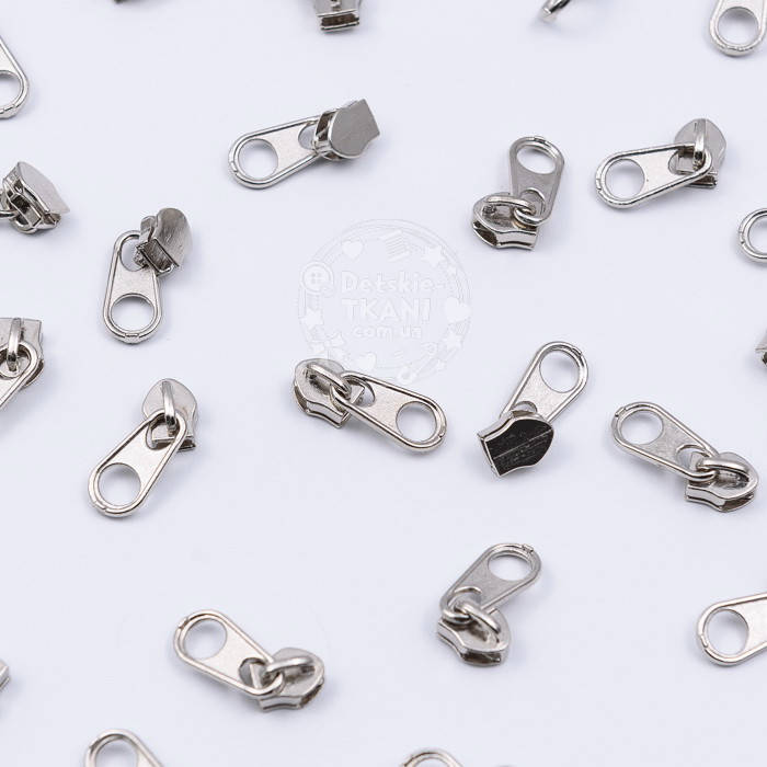 

Бегунок металлический никелированный стандартный для рулонной молнии Т3