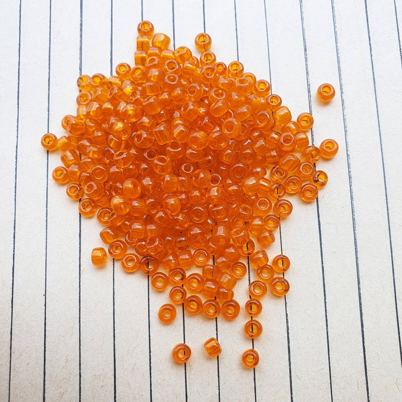 

Бісер Fancy, помаранчевий прозорий, великий 6/0, 45 г/упаковка