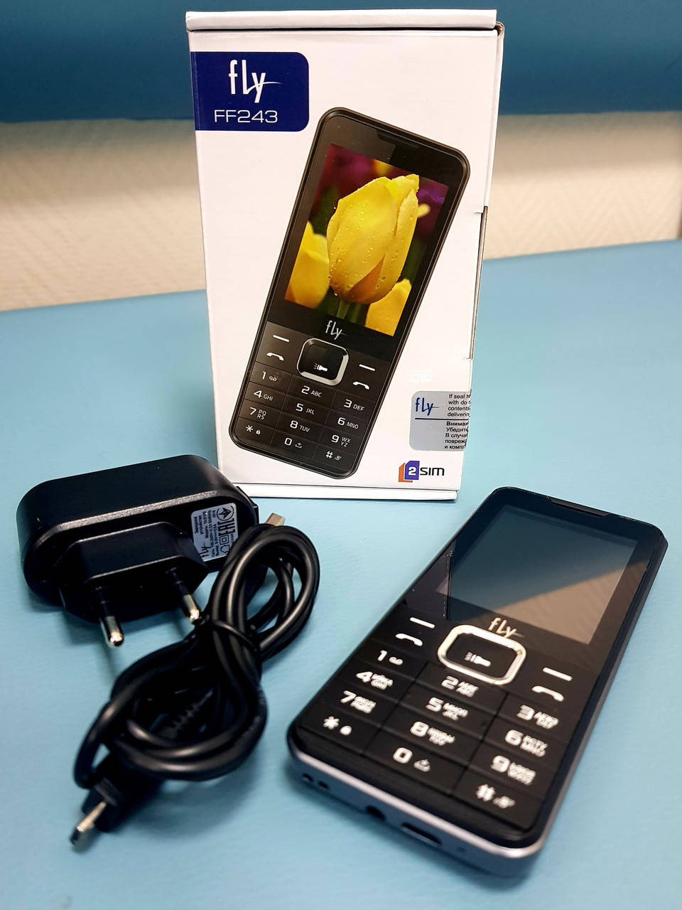 

Мобильный телефон б/у Fly FF243 Black полностью рабочий