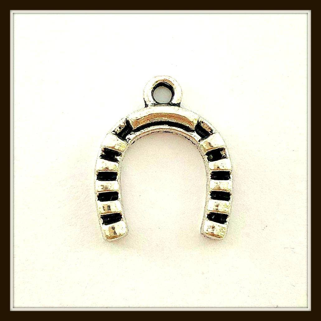 

Метал. подвеска "подкова" серебро ( см) 12 шт в уп.