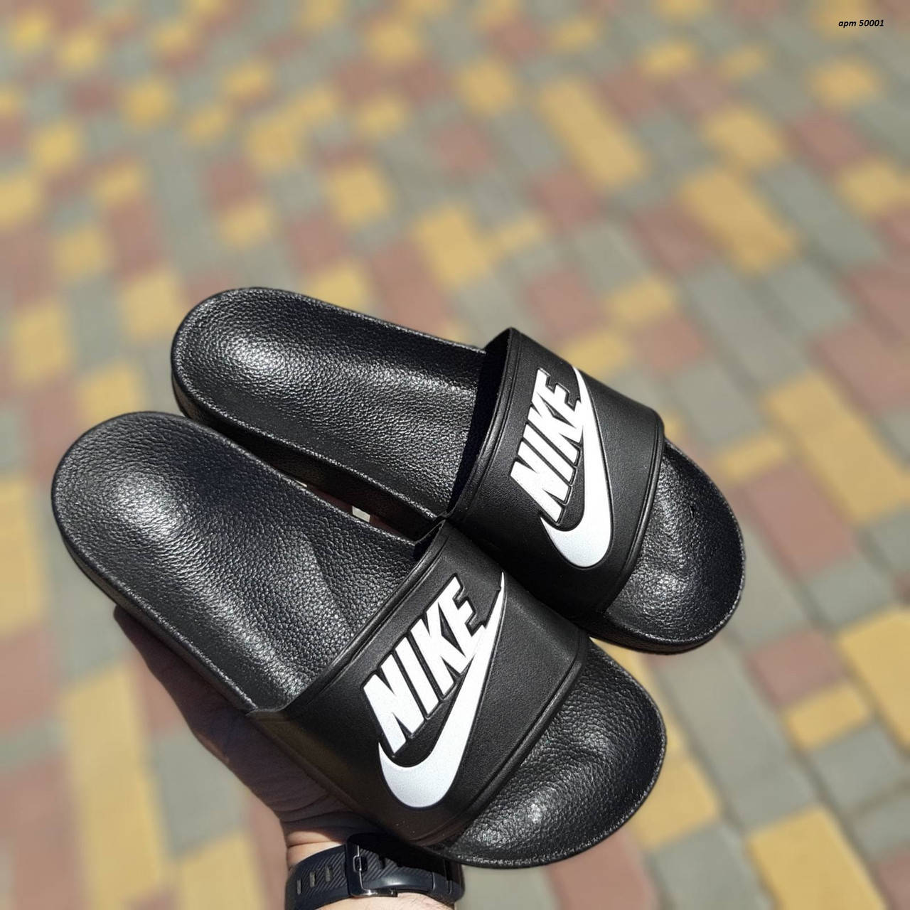 

Женские сланцы Nike Black