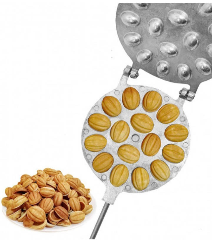 

Форма для випічки печиво "Горішки" 16 половинок з дерев'яними ручками.