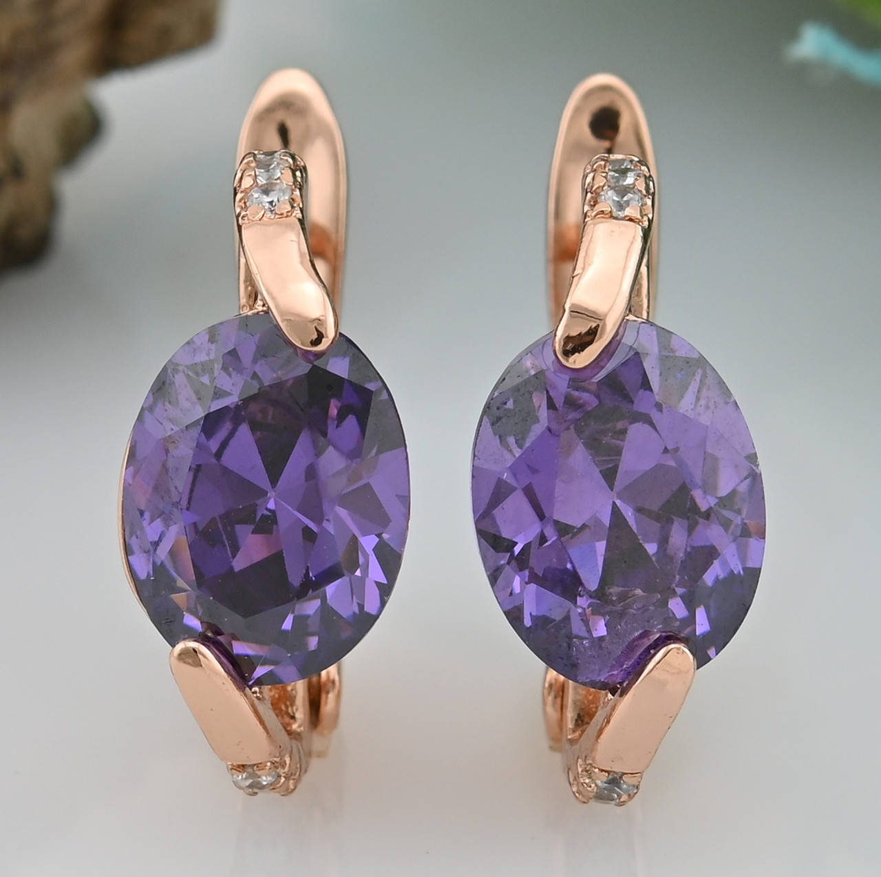 

Серьги Xuping 21392 размер 16х7 мм фиолетовые фианиты вес 3.2 г позолота РО