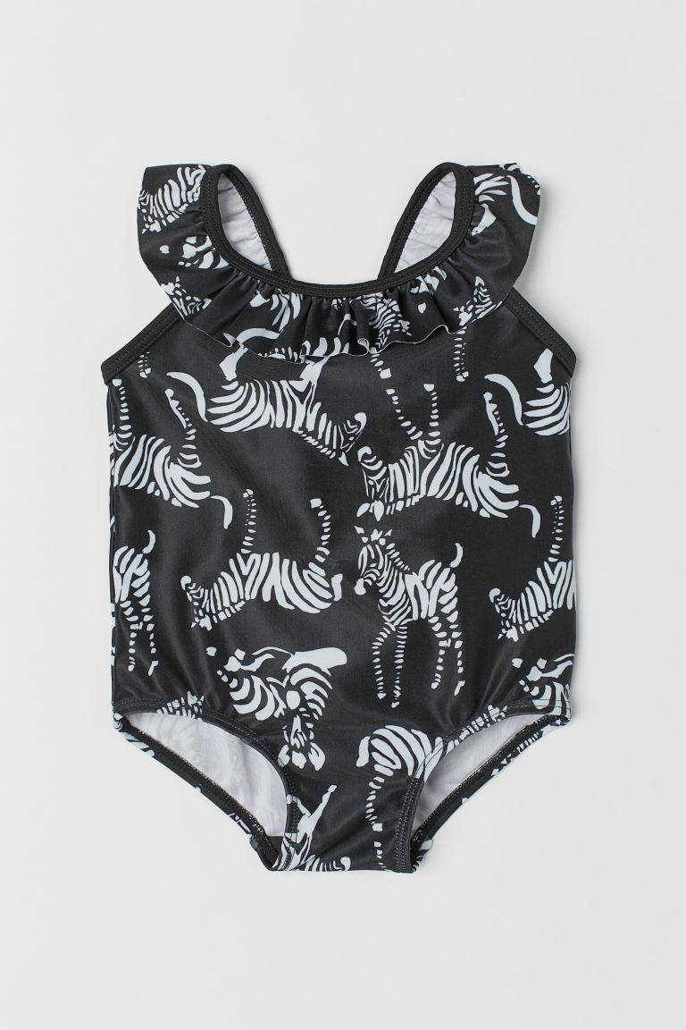 

Черный сдельный купальник с принтом НМ для девочки 6-12М - 80 см