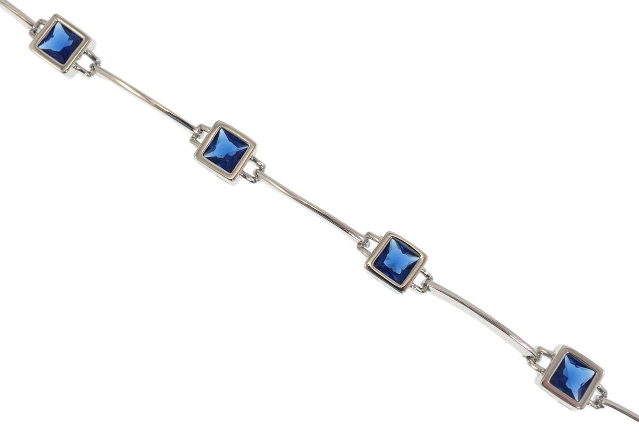 

Браслет Xuping Родий "Дорожка синих квадратных кристаллов" длина с доп.замком 17.5,19см х 1-7мм